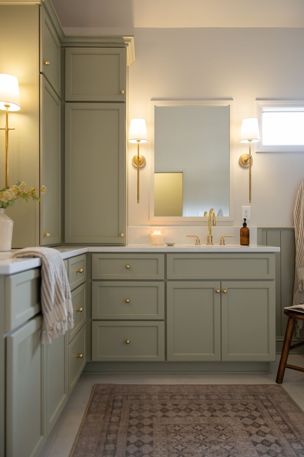 Green shaker bath cabinetry by Designer Cabinets
