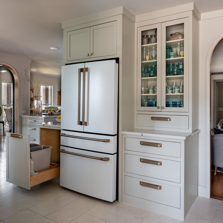 Greige shaker kitchen cabinetry by Designer Cabinets