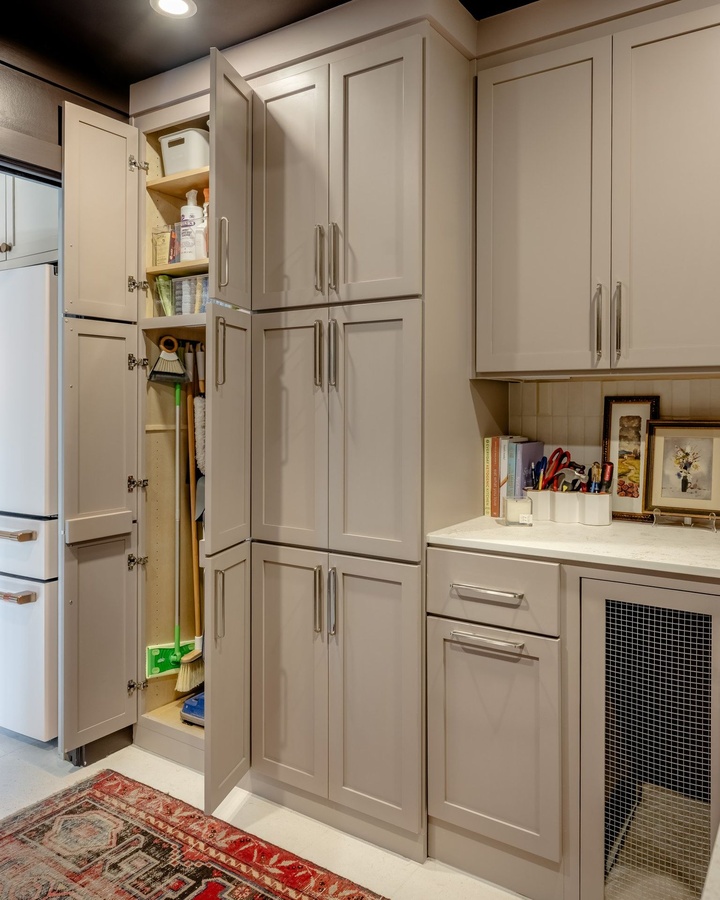 Greige shaker pantry cabinetry by Designer Cabinets