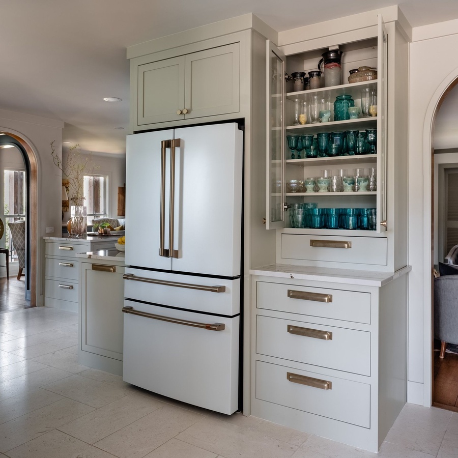 Greige shaker kitchen cabinetry by Designer Cabinets