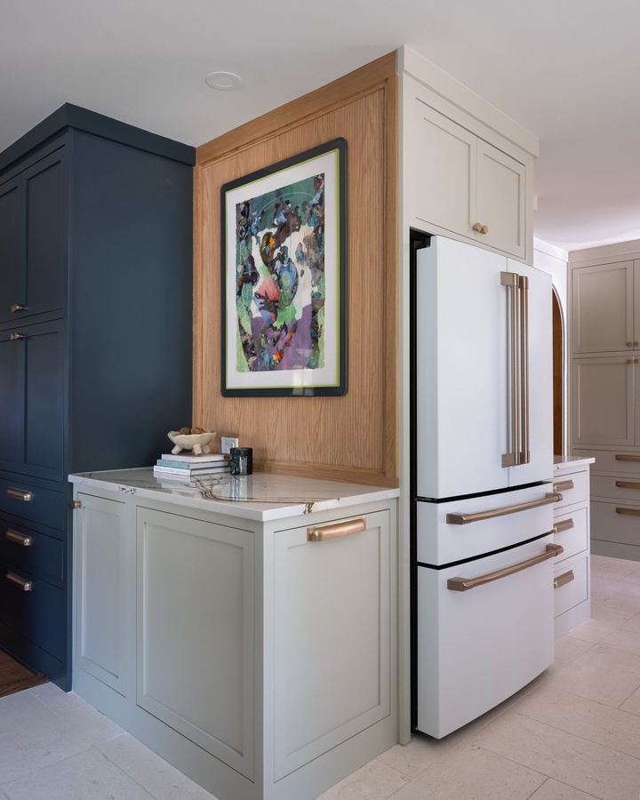 Greige shaker kitchen cabinetry by Designer Cabinets