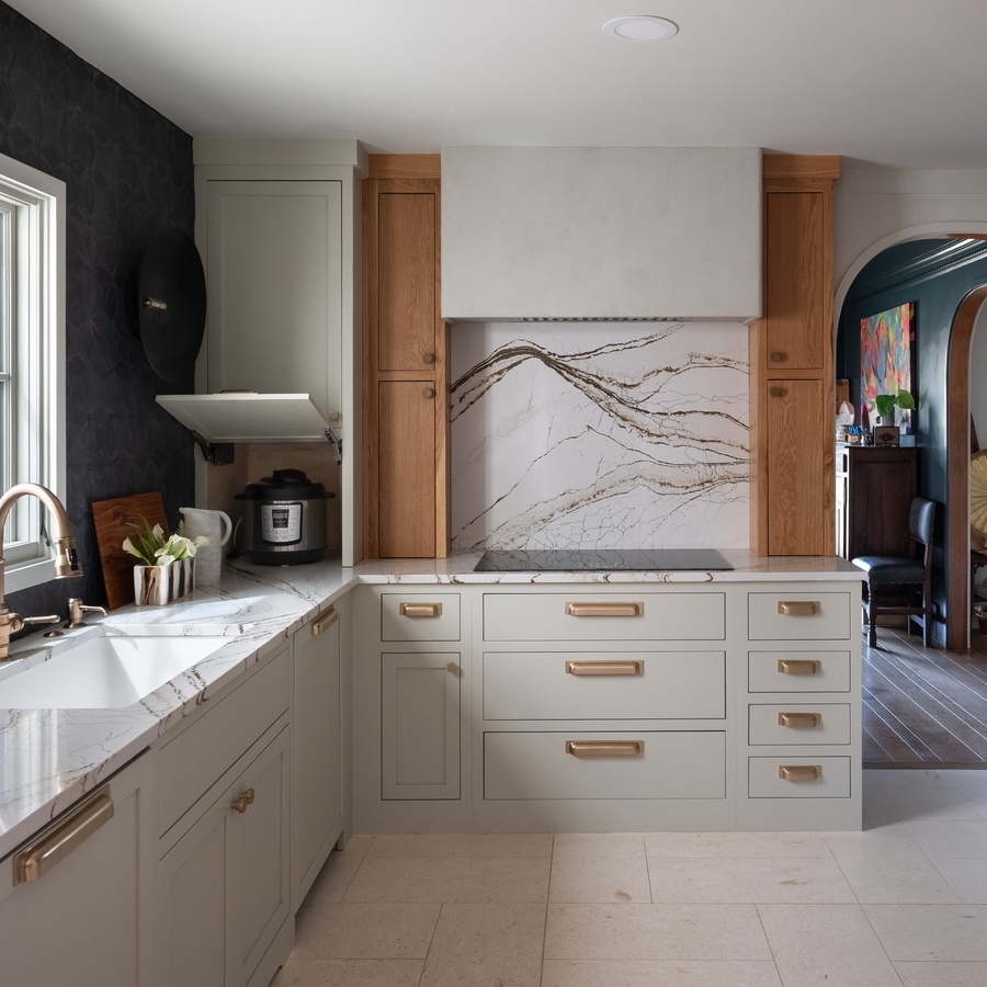 Greige shaker kitchen cabinetry by Designer Cabinets