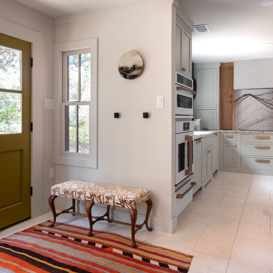 Greige shaker kitchen cabinetry by Designer Cabinets
