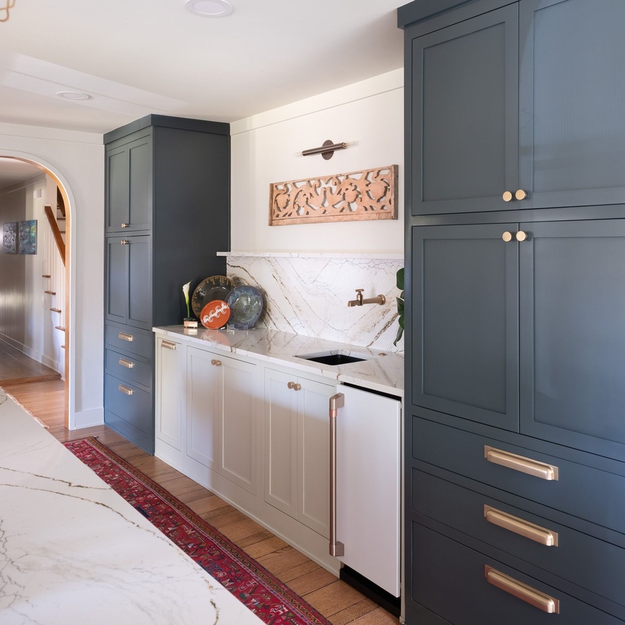 Greige shaker kitchen cabinetry by Designer Cabinets