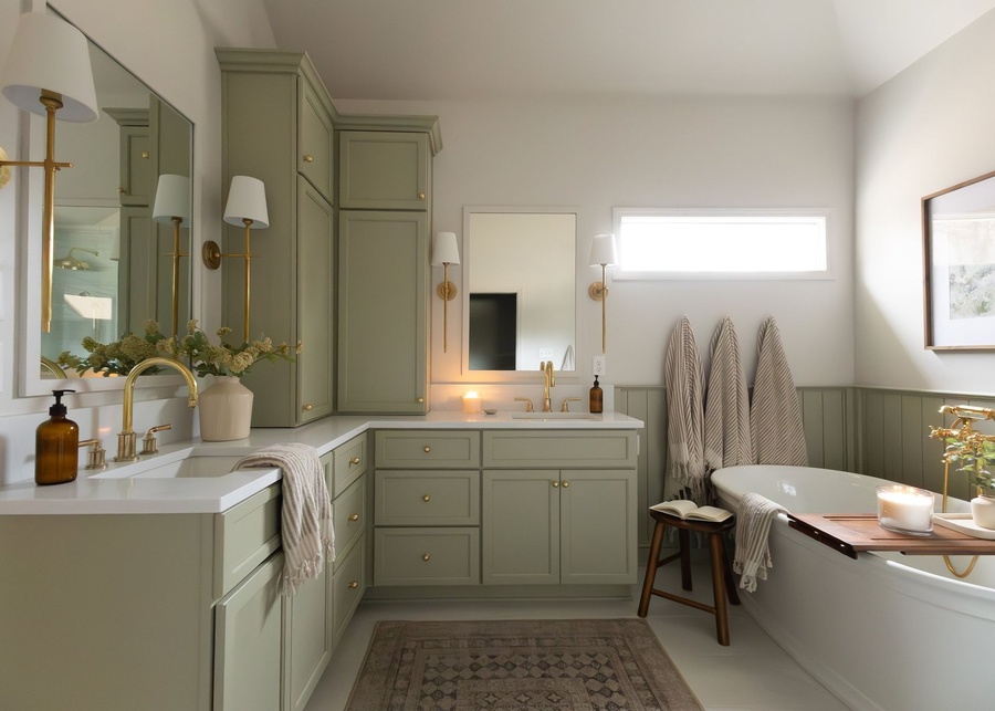 Green shaker bath cabinetry by Designer Cabinets