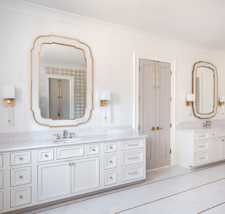 White shaker bath cabinetry by Designer Cabinets