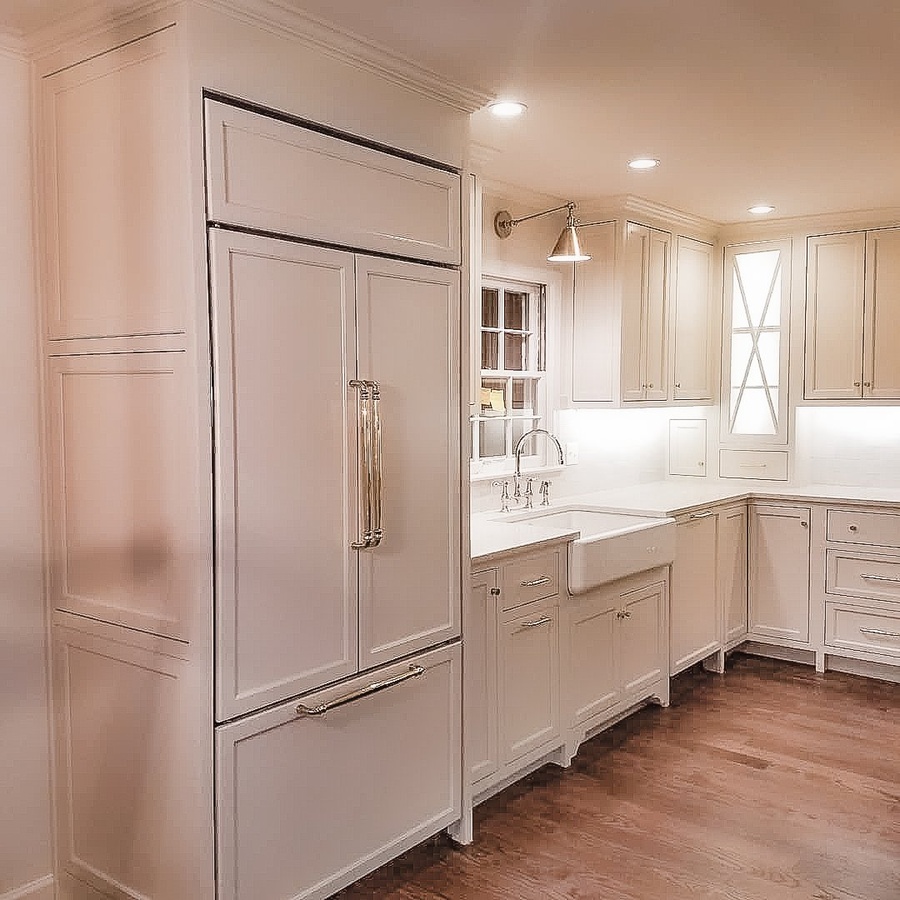 White farmhouse kitchen cabinetry by Designer Cabinets