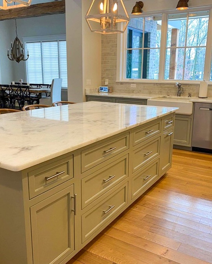 Green shaker kitchen cabinetry by Designer Cabinets