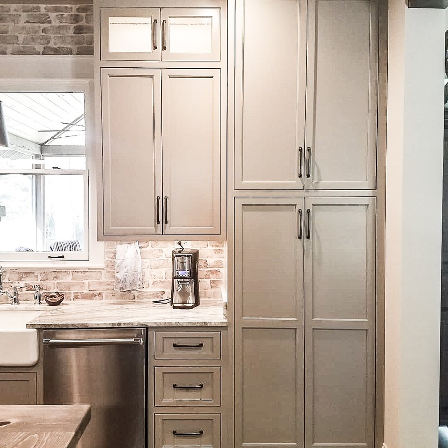 Greige farmhouse kitchen cabinetry by Designer Cabinets