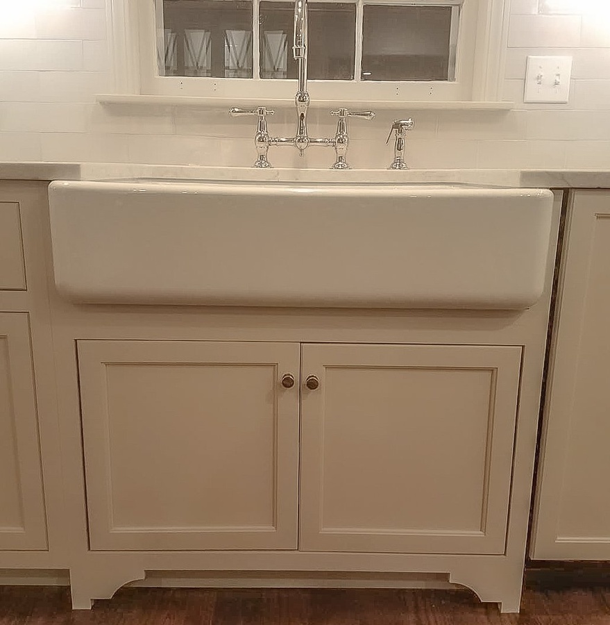 White farmhouse kitchen cabinetry by Designer Cabinets