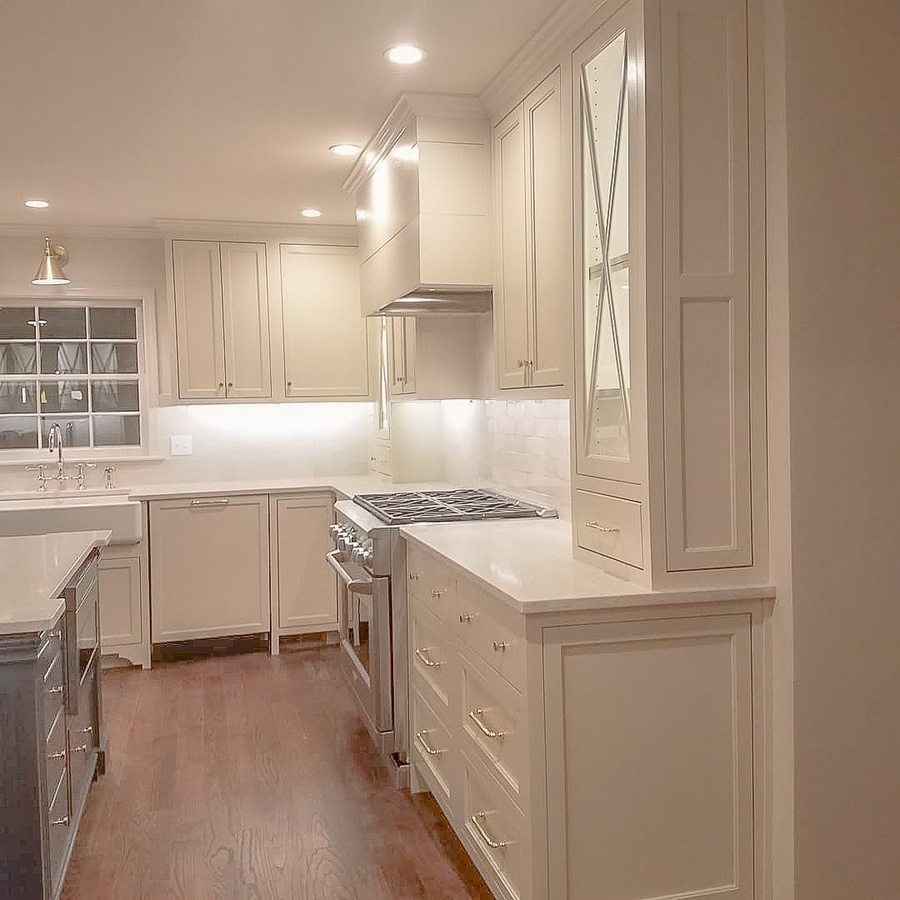 White farmhouse kitchen cabinetry by Designer Cabinets