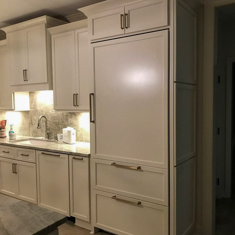 White shaker kitchen cabinetry by Designer Cabinets