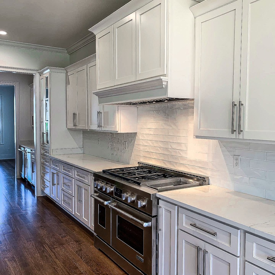 White shaker kitchen cabinetry by Designer Cabinets