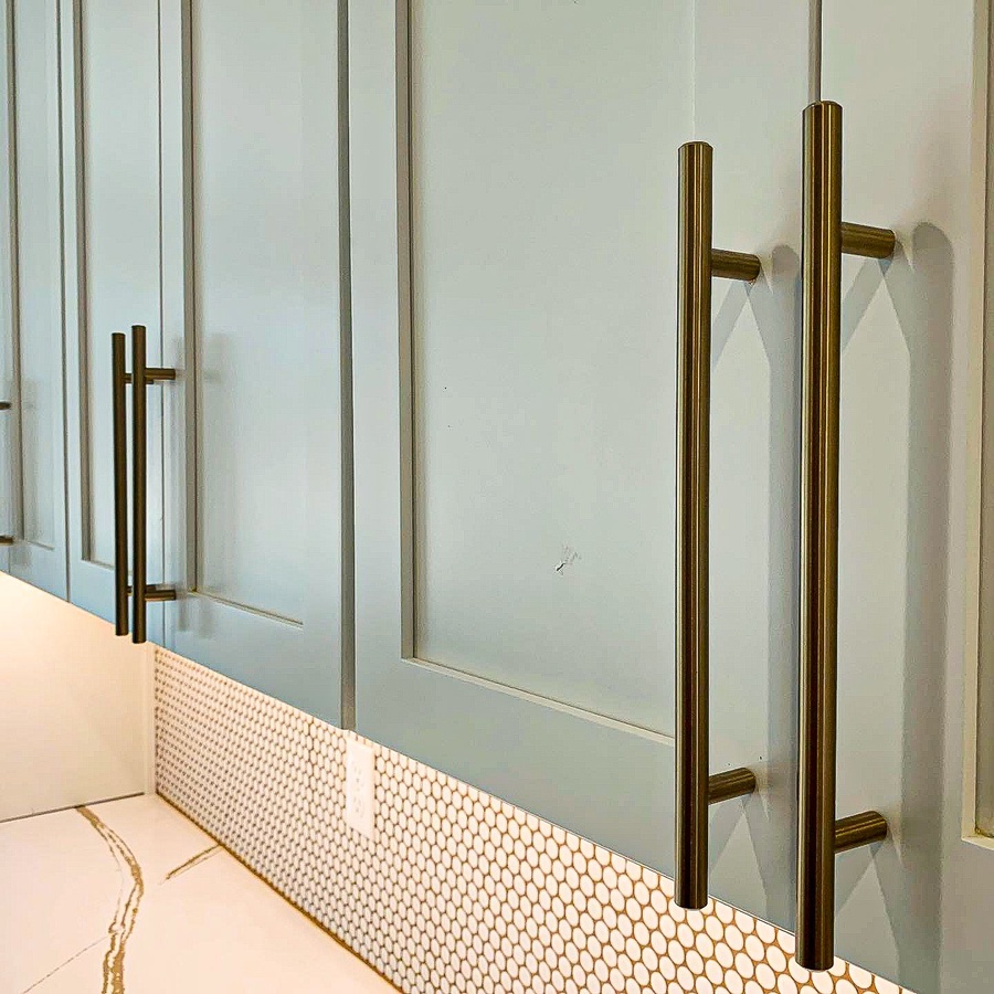 Green modern kitchen cabinetry by Designer Cabinets