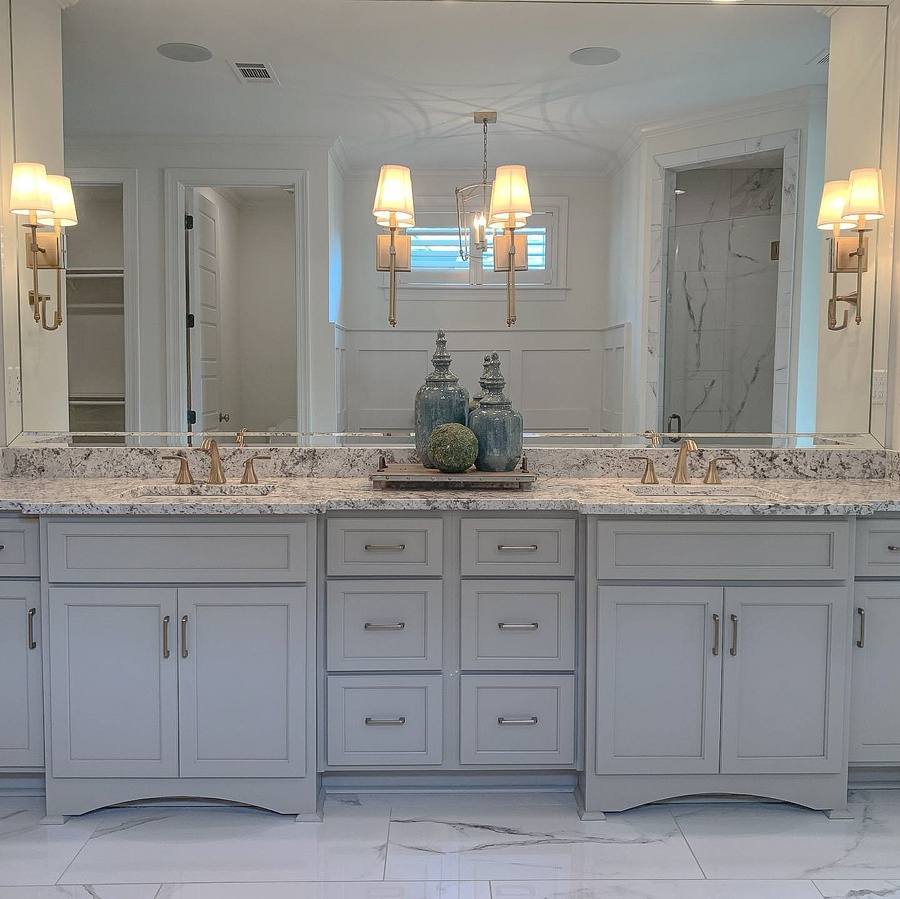 Gray shaker bath cabinetry by Designer Cabinets